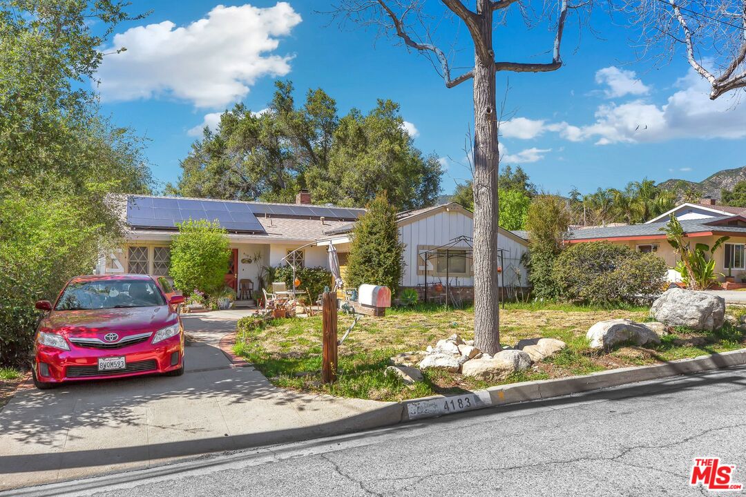 4183 Aralia Road Altadena, CA 91001 - Photo 3 of 40 a car parked in front of a house