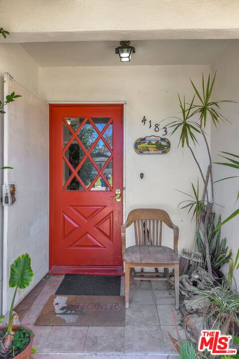 4183 Aralia Road Altadena, CA 91001 - Photo 6 of 40 a front view of a house with entryway