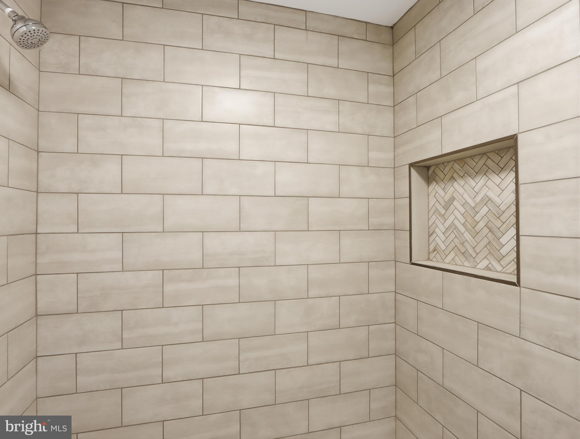 932 East 41st Street Baltimore, MD 21218 - Photo 23 of 51 a bathroom with a shower