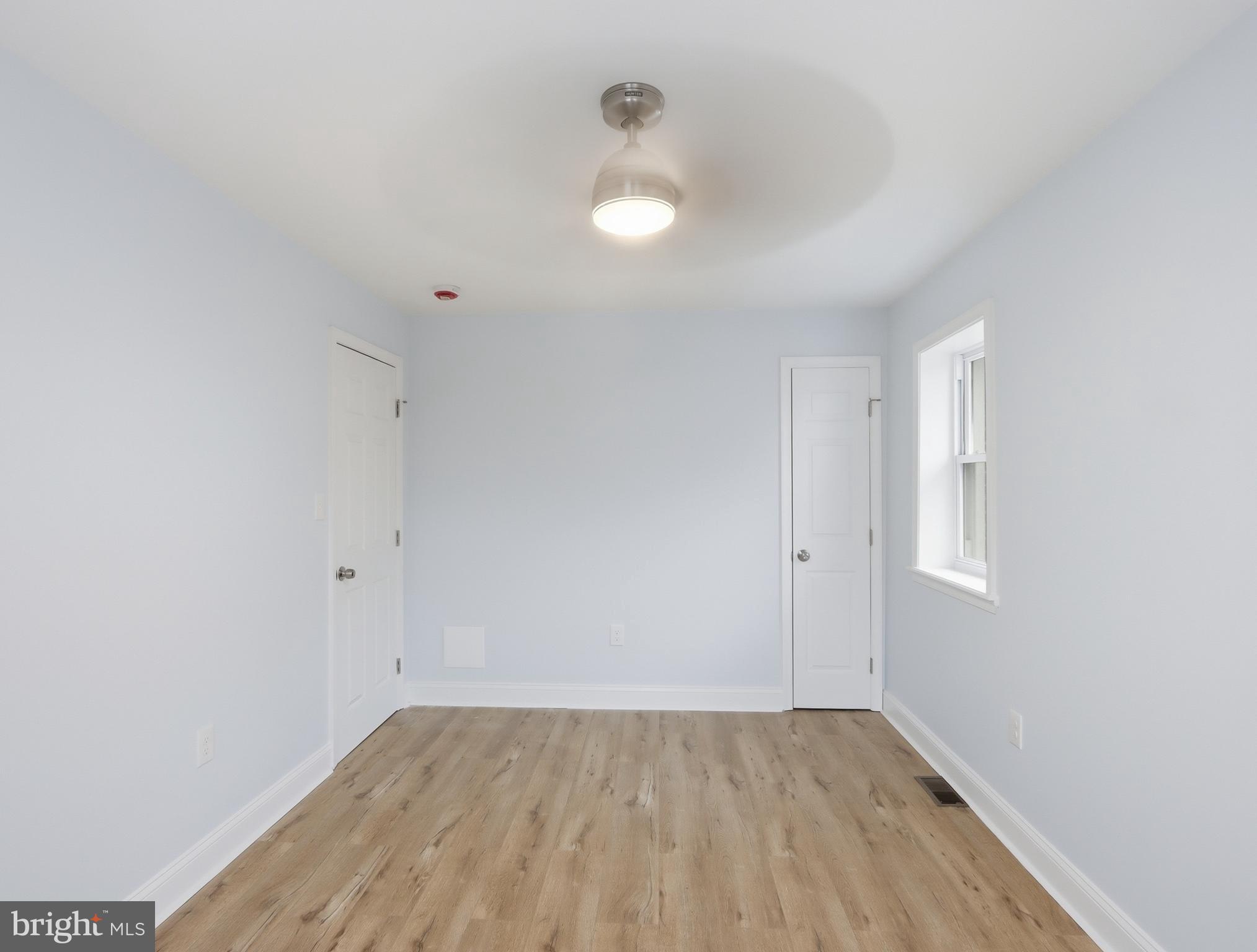 932 East 41st Street Baltimore, MD 21218 - Photo 24 of 51 an empty room with a empty space and window