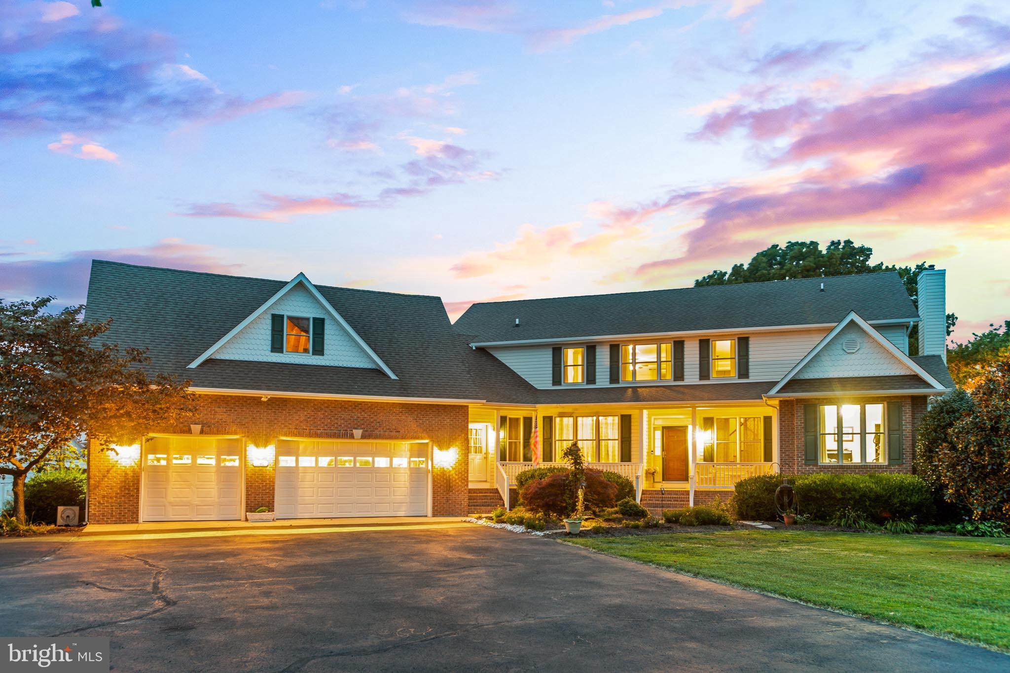 16405 Fishermen Way Ridge, MD 20680 - Photo 2 of 61 Twilight View of Main Home