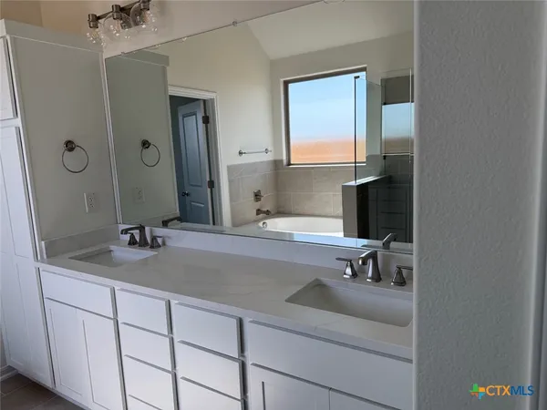 a view of a backyard with a small pool