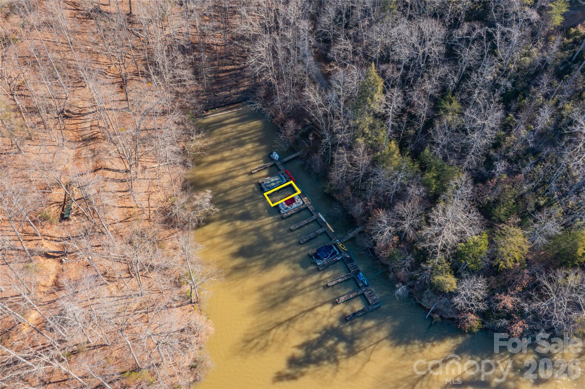 Lot 50-50a Mountain Pkwy Mill Spring, Unit 50 50A Mill Spring, NC 28756 - Photo 8 of 20 a view of a yard with trees