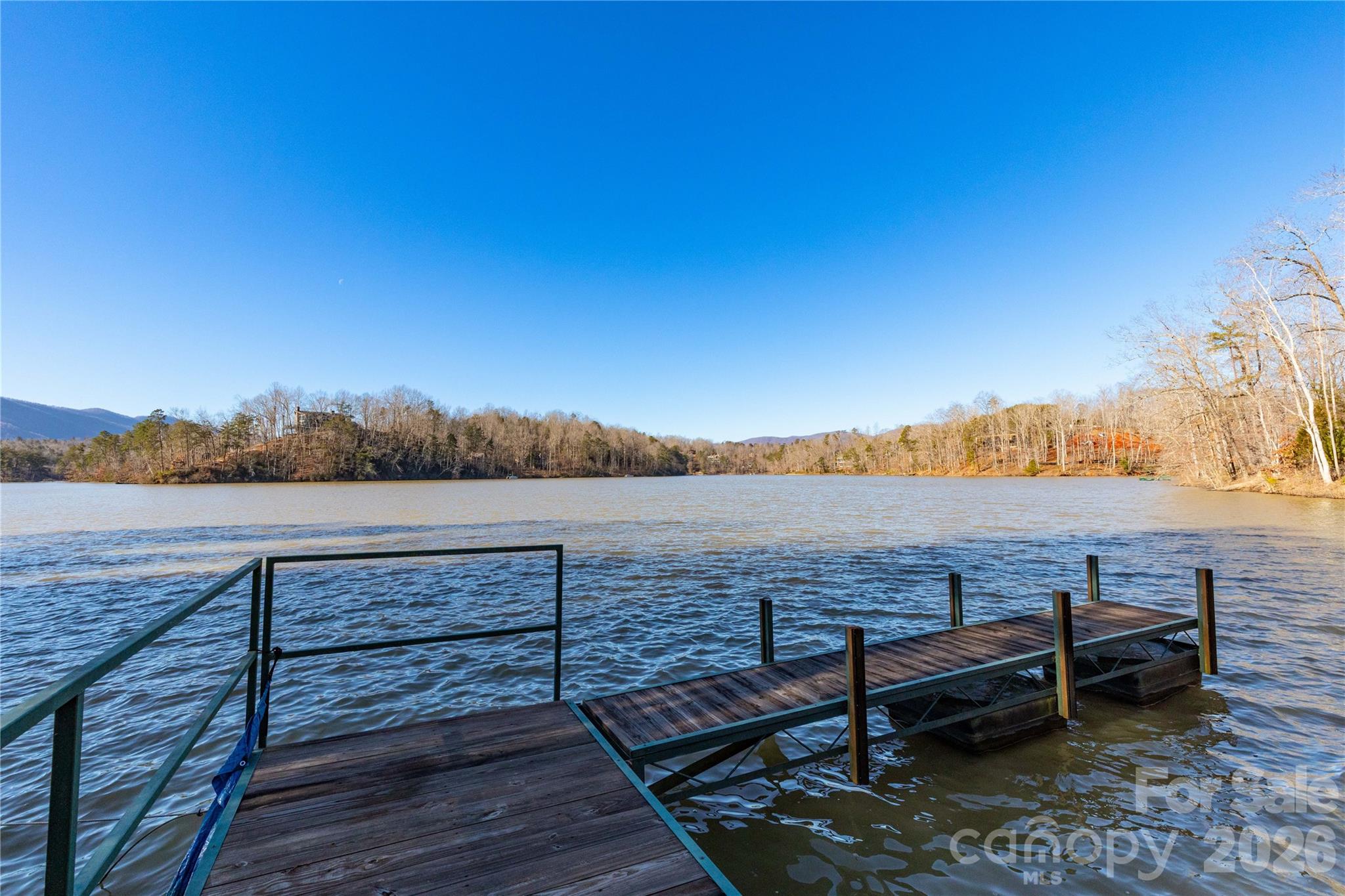 Lot 50-50a Mountain Pkwy Mill Spring, Unit 50 50A Mill Spring, NC 28756 - Photo 9 of 20 a view of a terrace with wooden floor and lake view