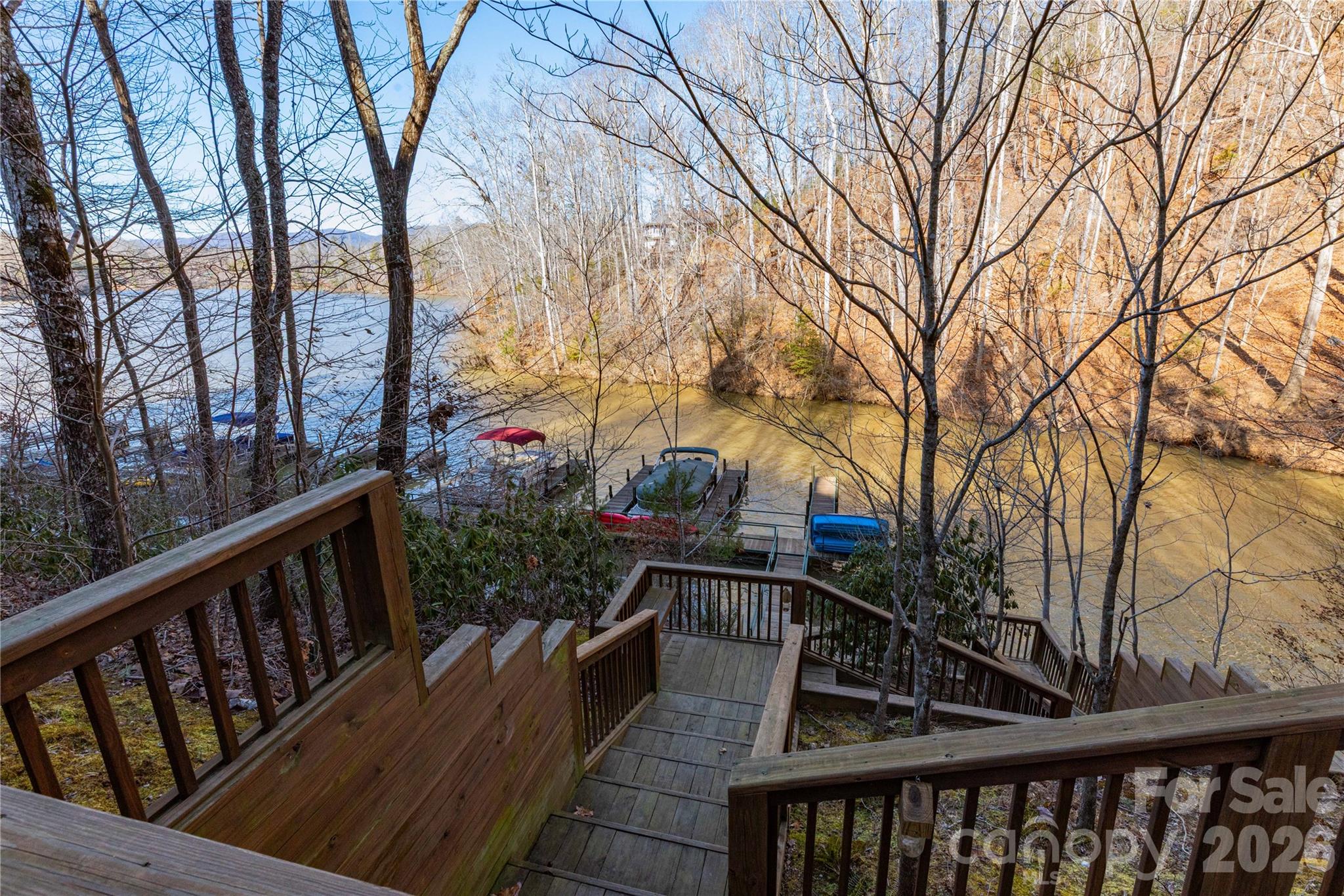 Lot 50-50a Mountain Pkwy Mill Spring, Unit 50 50A Mill Spring, NC 28756 - Photo 10 of 20 a view of trees and sky from balcony