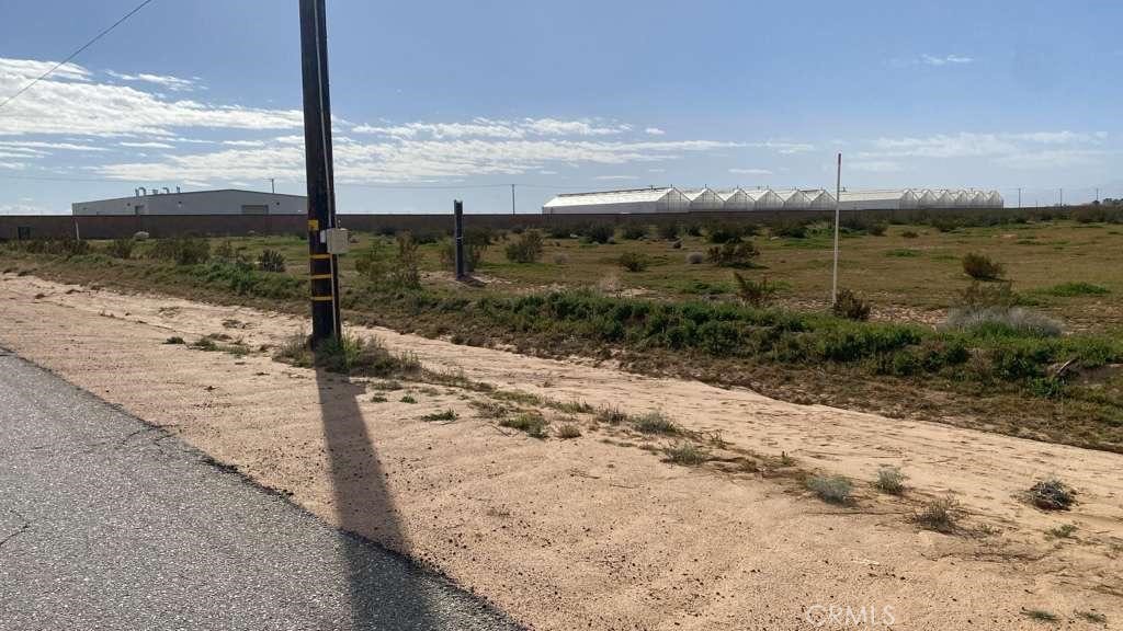 a view of a road with an ocean view
