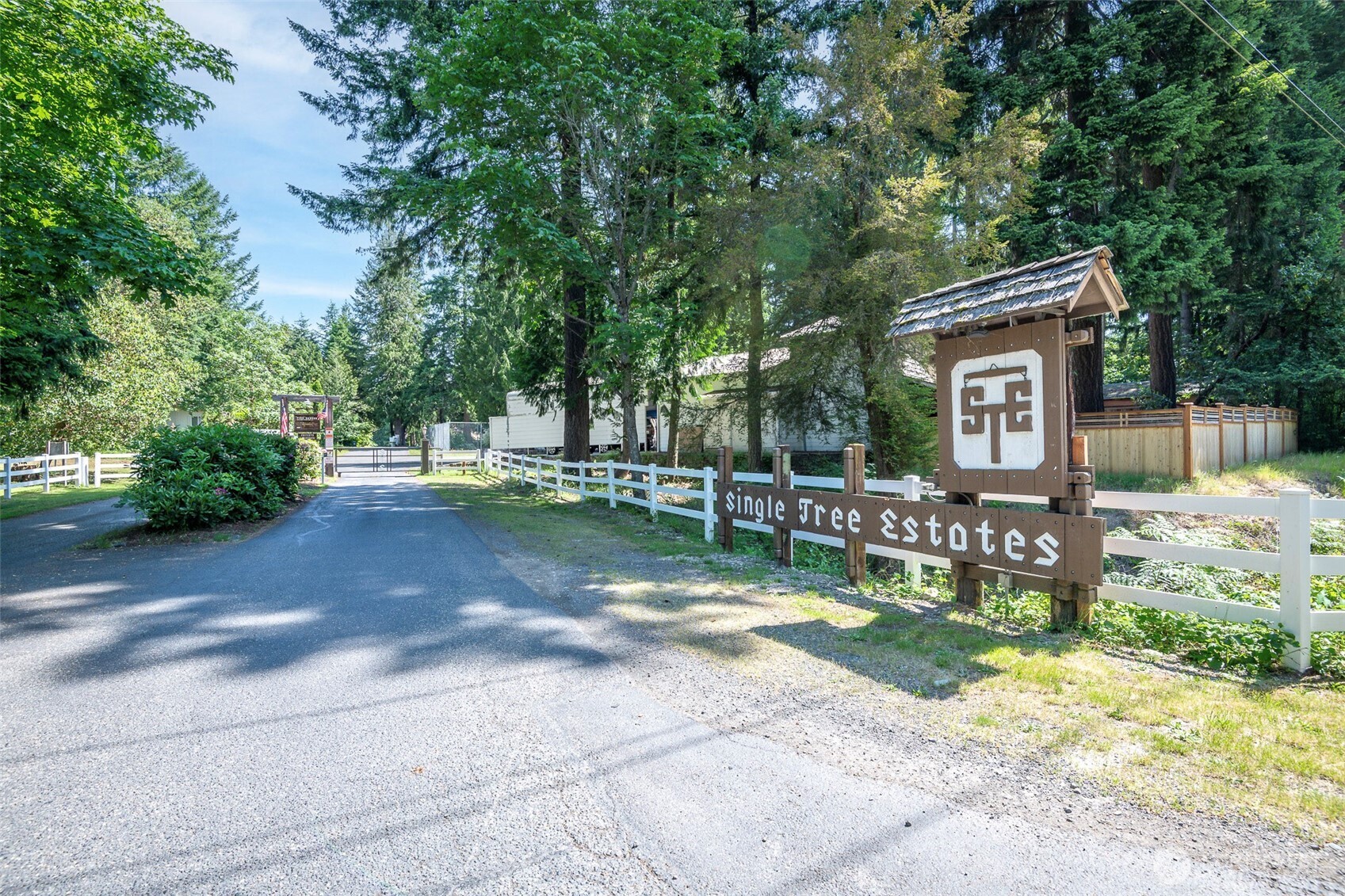 18547 Surcingle Court Southeast Yelm, WA 98597 - Photo 2 of 6 a front view of a house with a yard