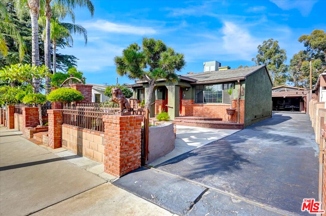 13611 Daventry Street Pacoima, CA 91331 - Photo 1 of 43 a view of a porch