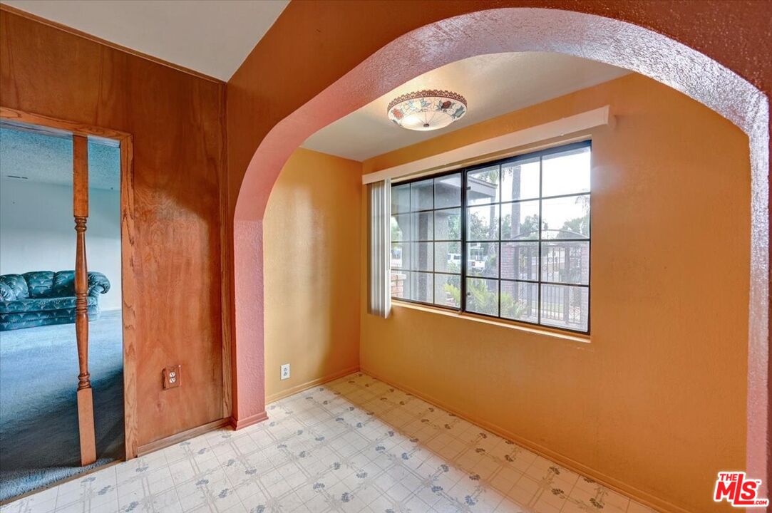 13611 Daventry Street Pacoima, CA 91331 - Photo 13 of 43 a view of an empty room with a window