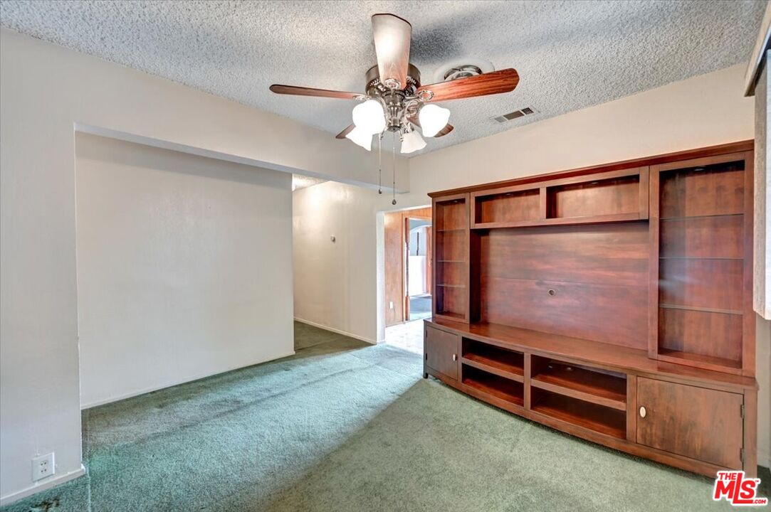 13611 Daventry Street Pacoima, CA 91331 - Photo 15 of 43 a living room with furniture