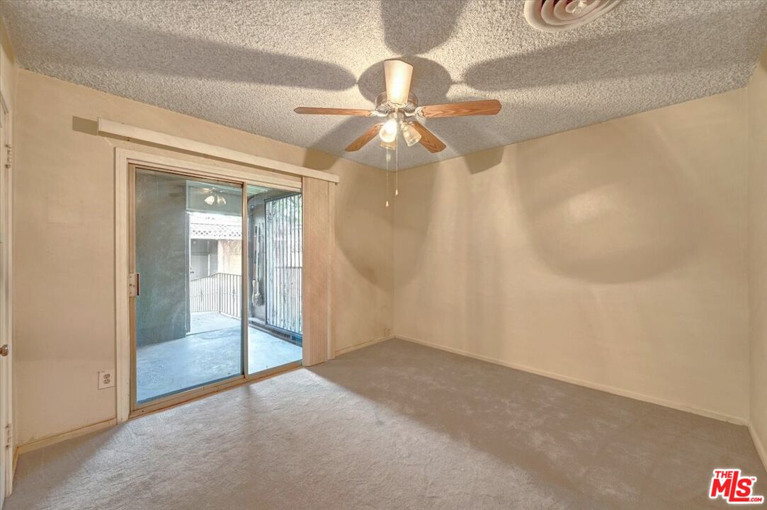 13611 Daventry Street Pacoima, CA 91331 - Photo 21 of 43 an empty room with fan and entryway