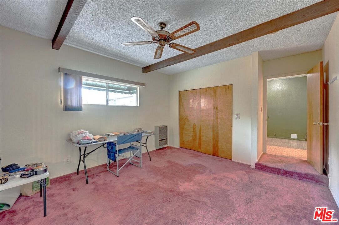 13611 Daventry Street Pacoima, CA 91331 - Photo 25 of 43 a view of room with workspace and windows