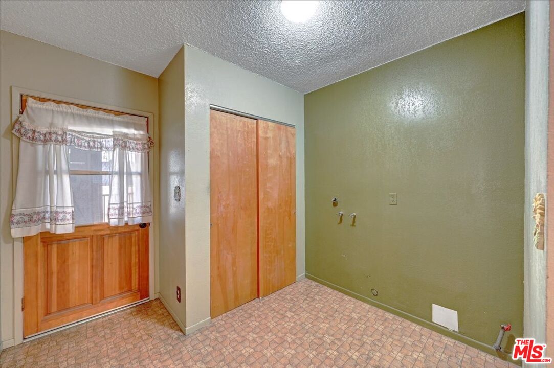13611 Daventry Street Pacoima, CA 91331 - Photo 26 of 43 a view of an empty room with a window