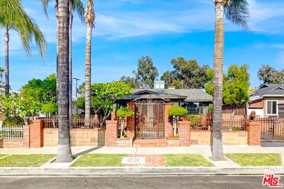 13611 Daventry Street Pacoima, CA 91331 - Photo 3 of 43 a patio with water view and tables back yard