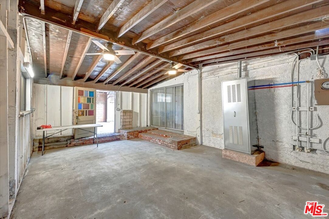 13611 Daventry Street Pacoima, CA 91331 - Photo 31 of 43 a view of an empty room with a window
