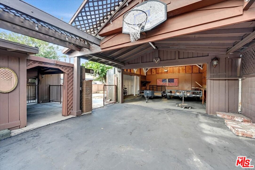 13611 Daventry Street Pacoima, CA 91331 - Photo 32 of 43 a view of empty room with wooden floor