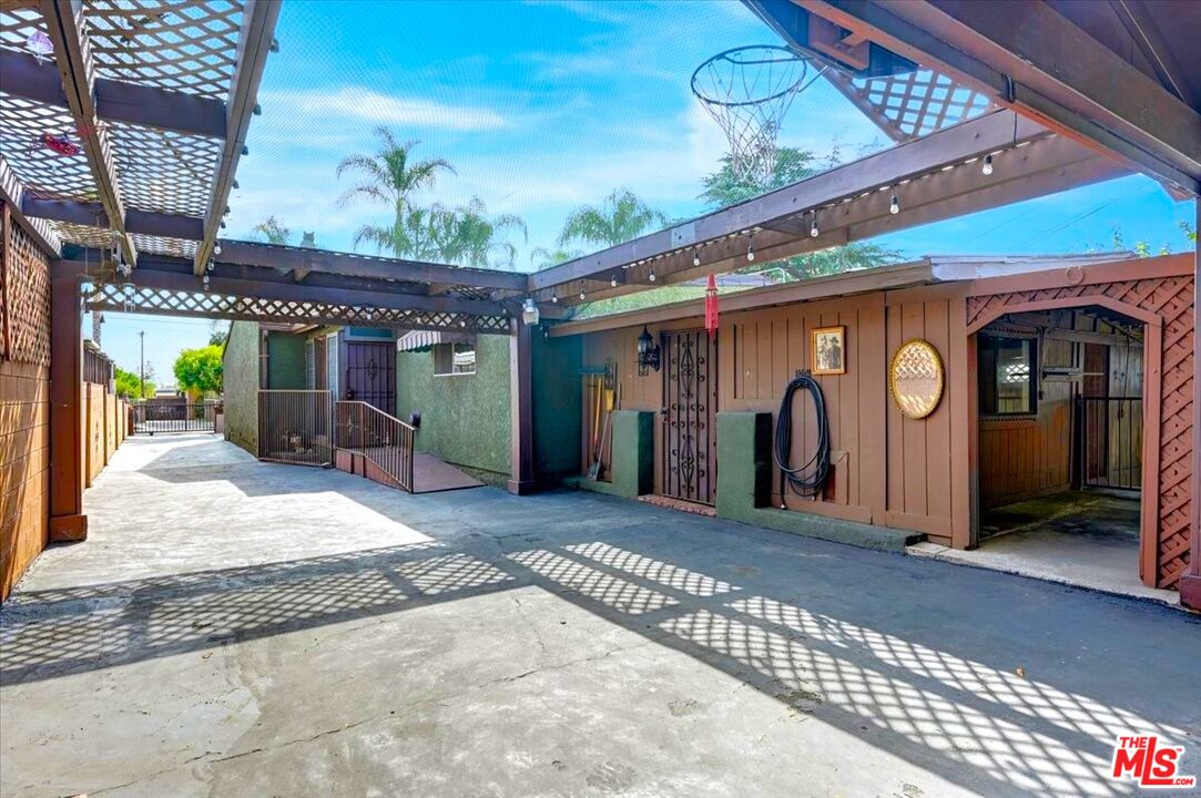 13611 Daventry Street Pacoima, CA 91331 - Photo 34 of 43 a view of a room with a patio