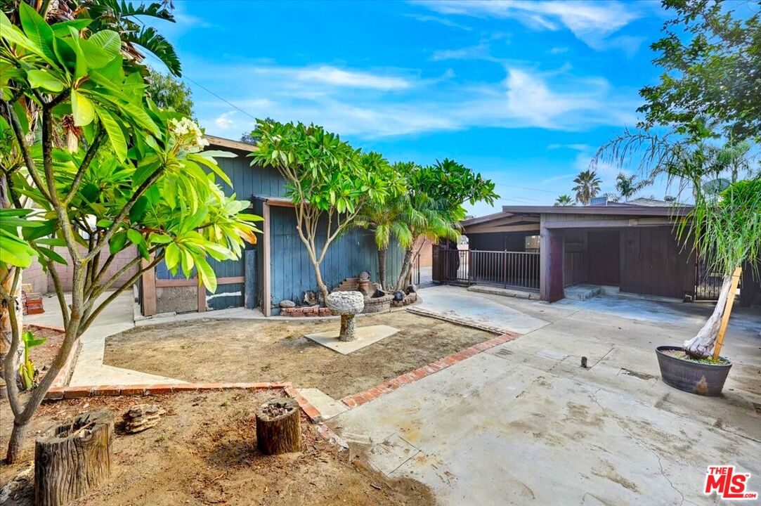 13611 Daventry Street Pacoima, CA 91331 - Photo 35 of 43 a view of a backyard with a sitting area