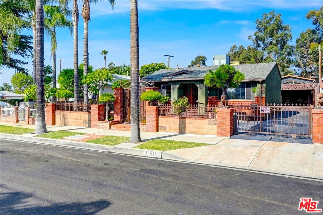 13611 Daventry Street Pacoima, CA 91331 - Photo 43 of 43 a view of a patio with a table and chairs
