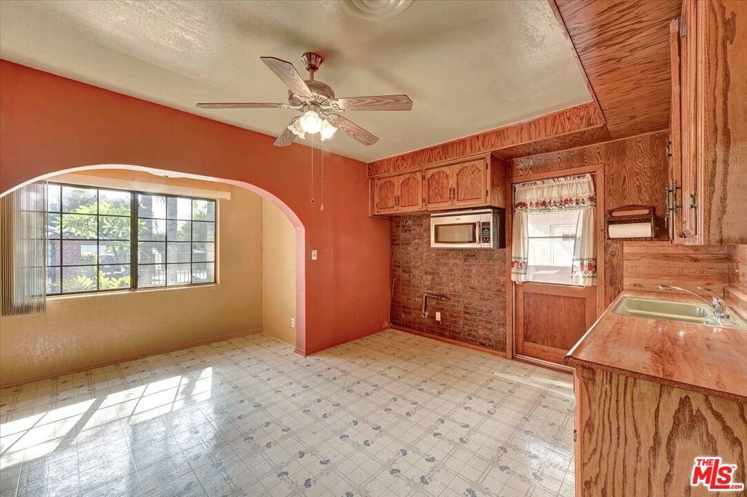 13611 Daventry Street Pacoima, CA 91331 - Photo 10 of 43 a view of an empty room with a window