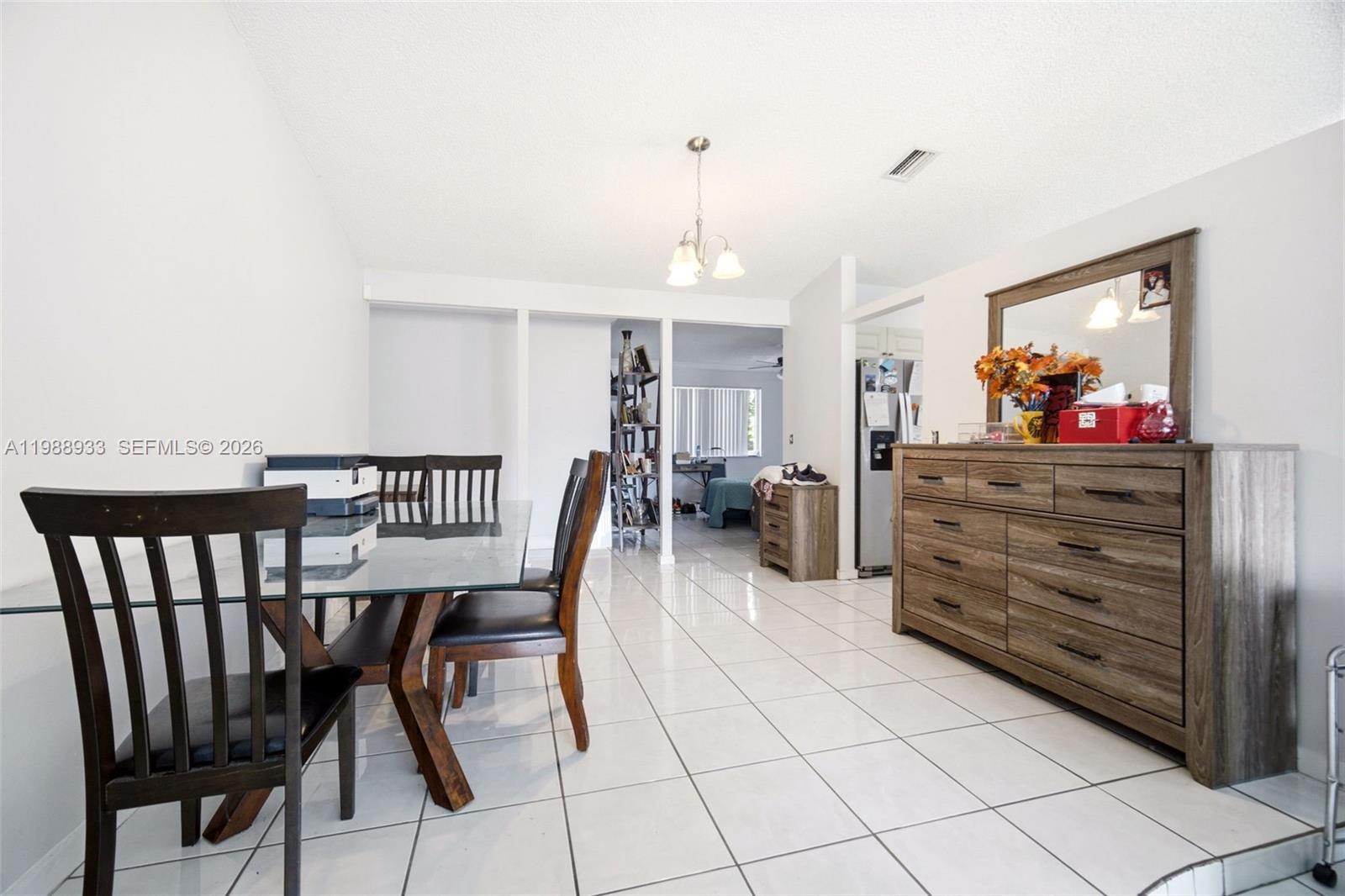 841 Southwest 55th Avenue Margate, FL 33068 - Photo 6 of 26 a dining room with furniture and window