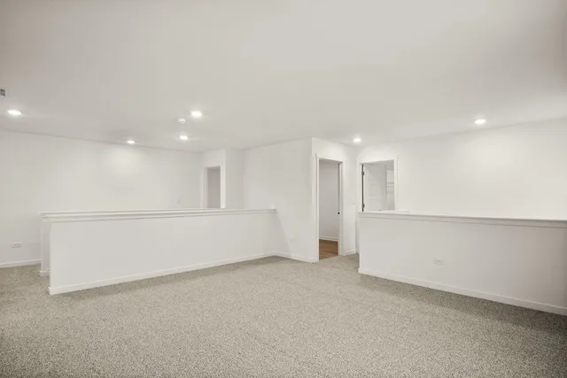a bathroom with a sink and a large mirror