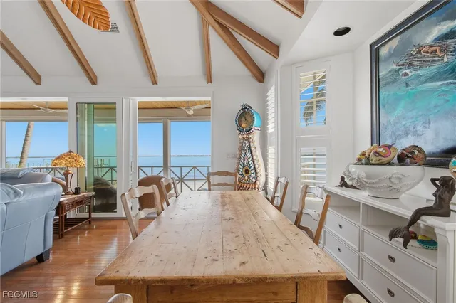 a kitchen with cabinets stainless steel appliances and a sink