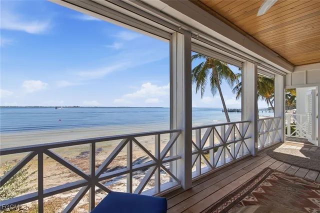 a view of a chairs and table on the wooden floor