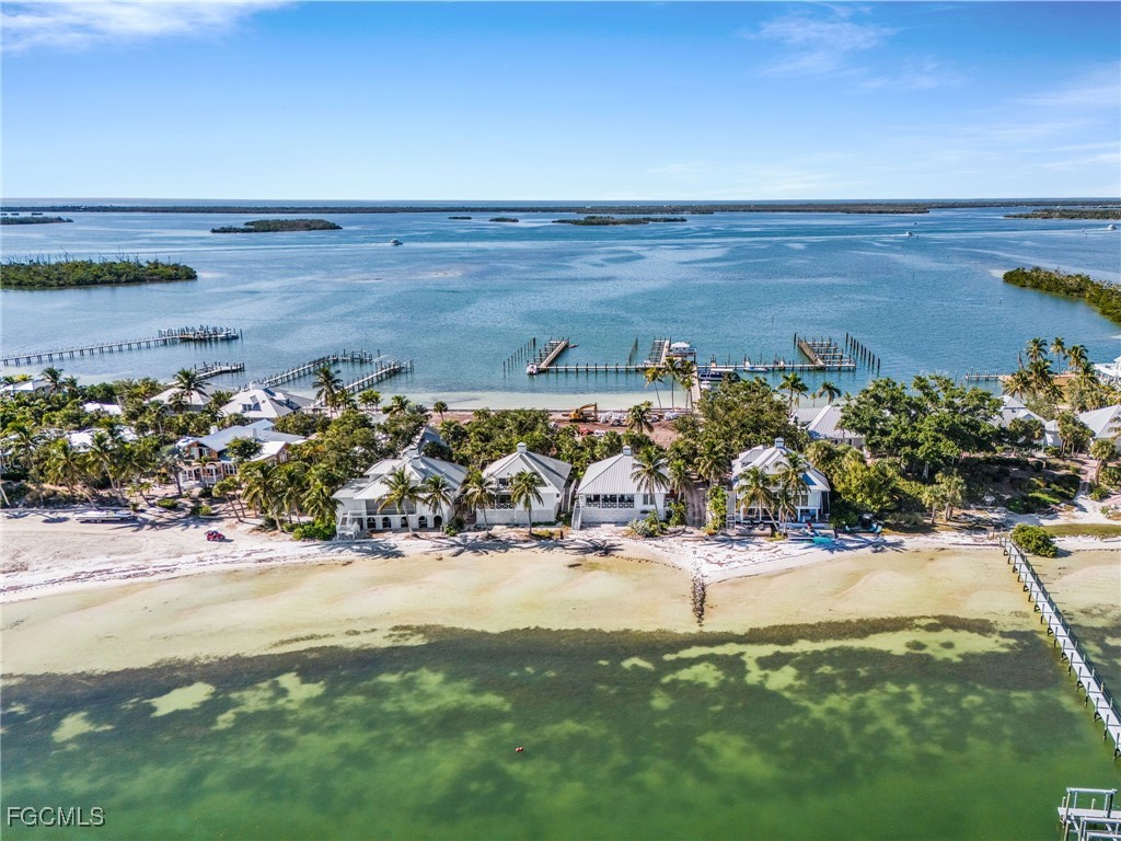 115 Useppa Island Bokeelia, FL 33922 - Photo 9 of 38 a view of a lake with a yard