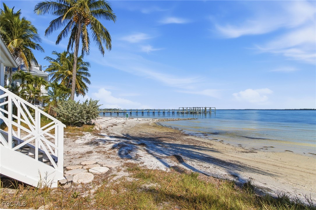 115 Useppa Island Bokeelia, FL 33922 - Photo 10 of 38 a view of a lake and a beach