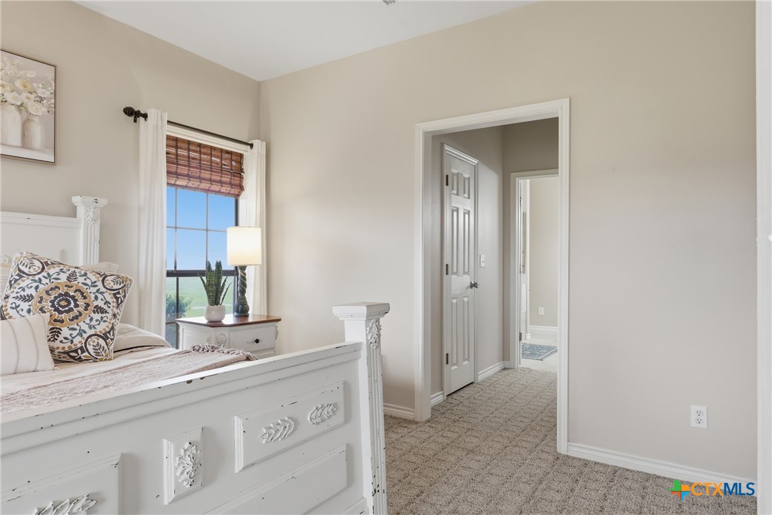 457-459 Buentello Road Victoria, TX 77905 - Photo 18 of 35 a spacious bathroom with a double vanity sink and a mirror
