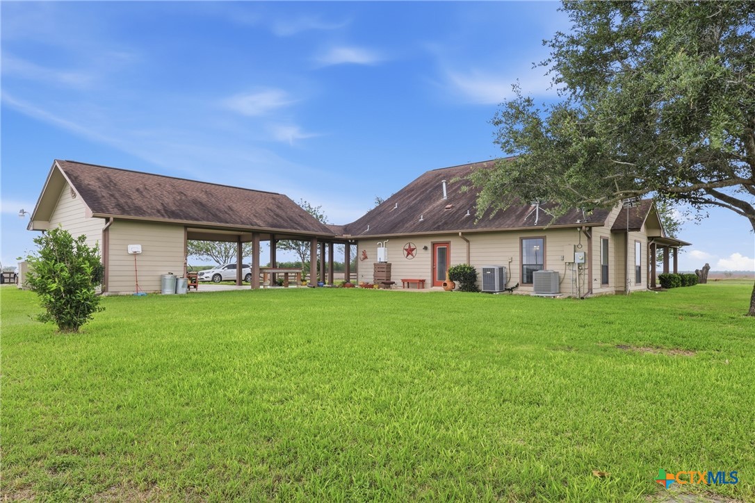 457-459 Buentello Road Victoria, TX 77905 - Photo 32 of 35 a view of a house with a yard