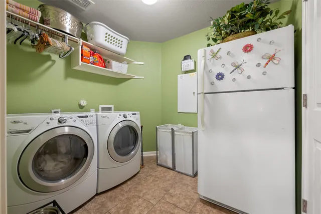 a white toilet sitting next to a shower curtain