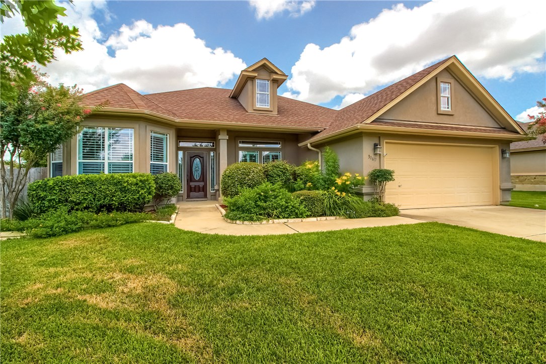 30617 Chi Chi Drive Georgetown, TX 78628 - Photo 1 of 1 a front view of a house with a yard