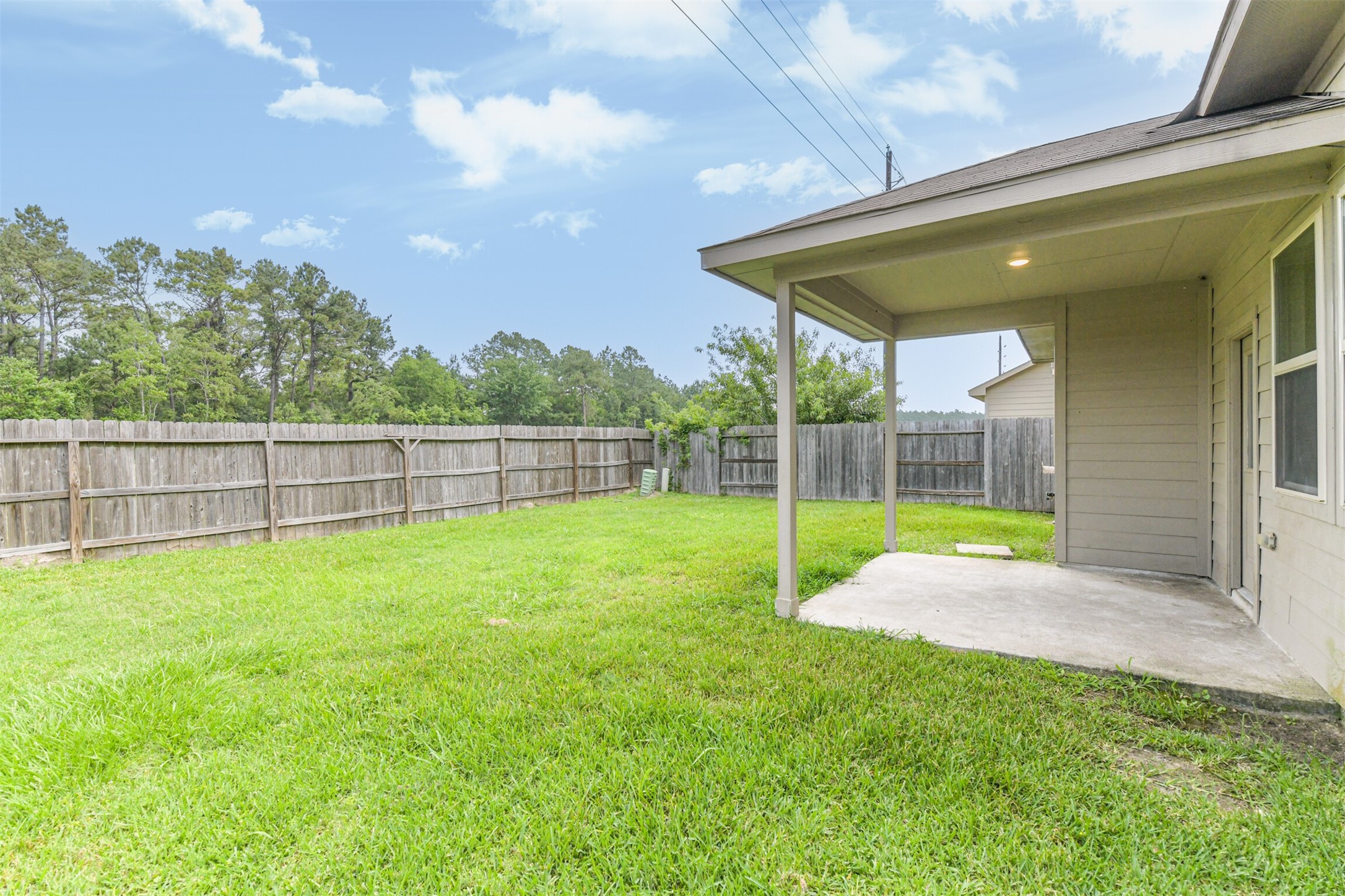 12638 Silver Winter Trail Houston, TX 77014 - Photo 23 of 35 Large Backyard with Space for Outdoor Grilling or Children Playing! A Covered Patio is Perfect for Sitting Out on Misty Days!