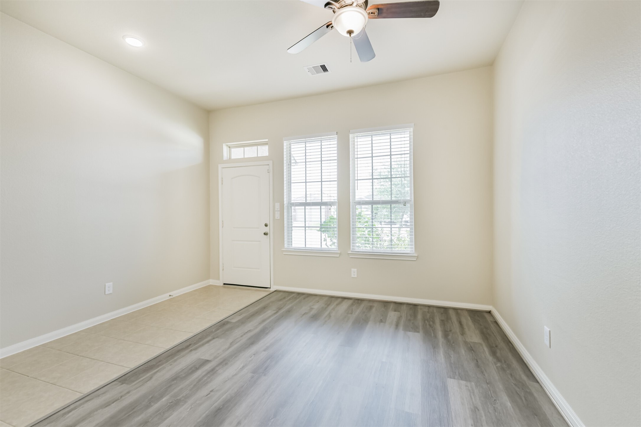12638 Silver Winter Trail Houston, TX 77014 - Photo 30 of 35 Review - The Front Room Showing Easy Front Door Access for a Home Office, Where Clients Need to Visit Occasionally! Direct Access to the Kitchen Makes This Space a Wonderful Formal Dining Room!