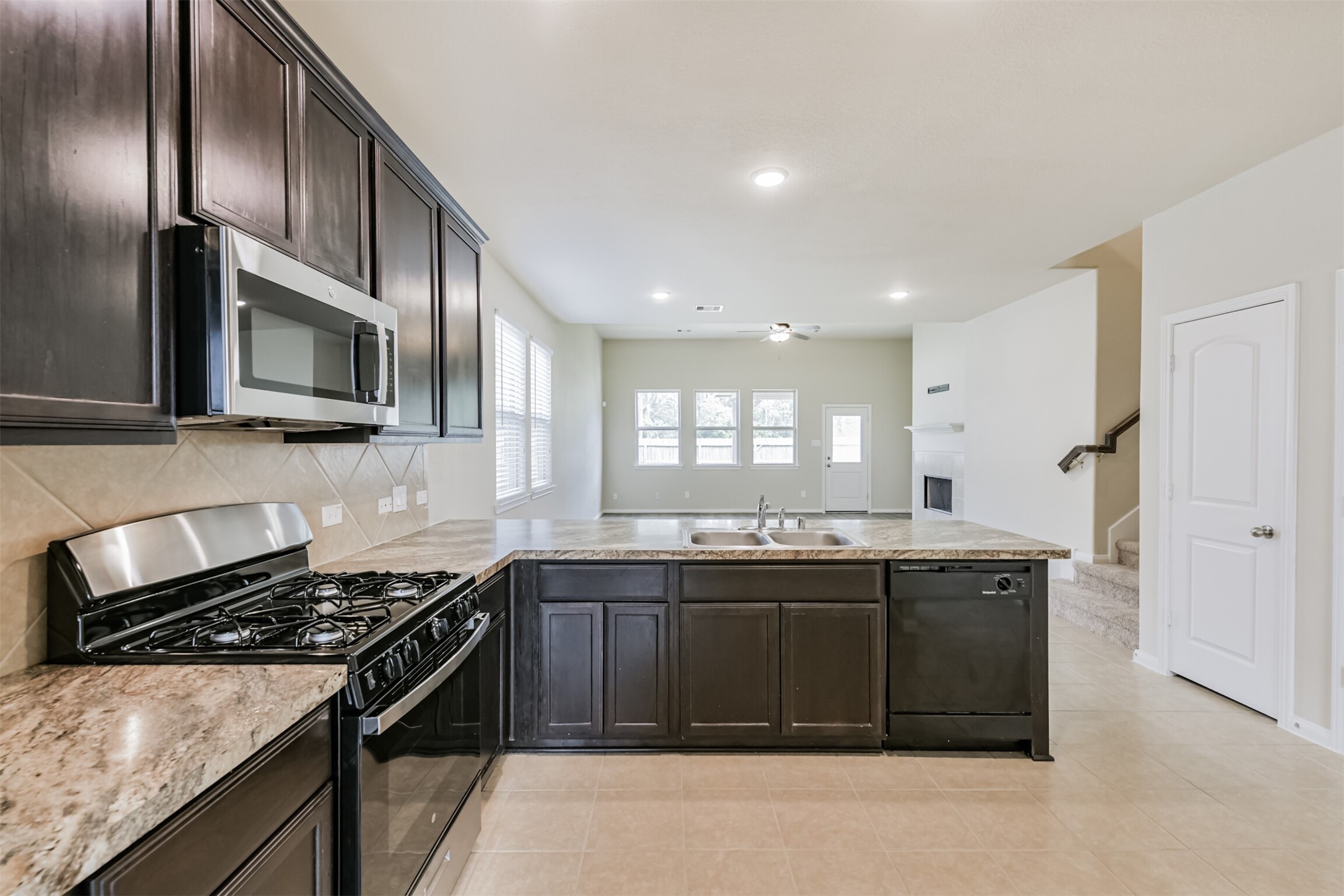 12638 Silver Winter Trail Houston, TX 77014 - Photo 31 of 35 Review - Kitchen Perspective from the Front Portion of the Home to the Rear!