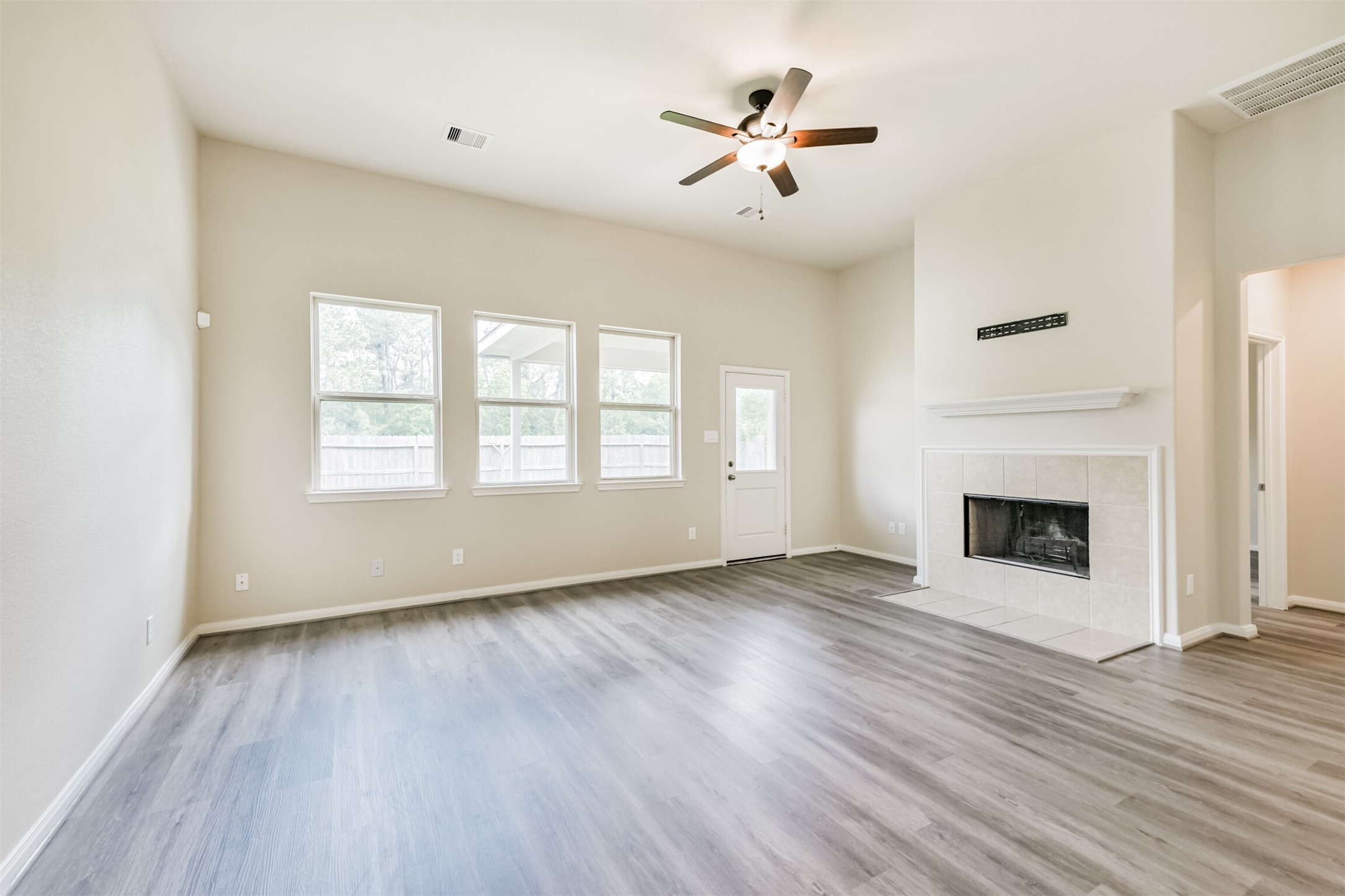 12638 Silver Winter Trail Houston, TX 77014 - Photo 34 of 35 Another View of the Large Living Area - Bright with Lots of Natural Light! Check Out This Working Fireplace for Those Romantic Winter Nights!