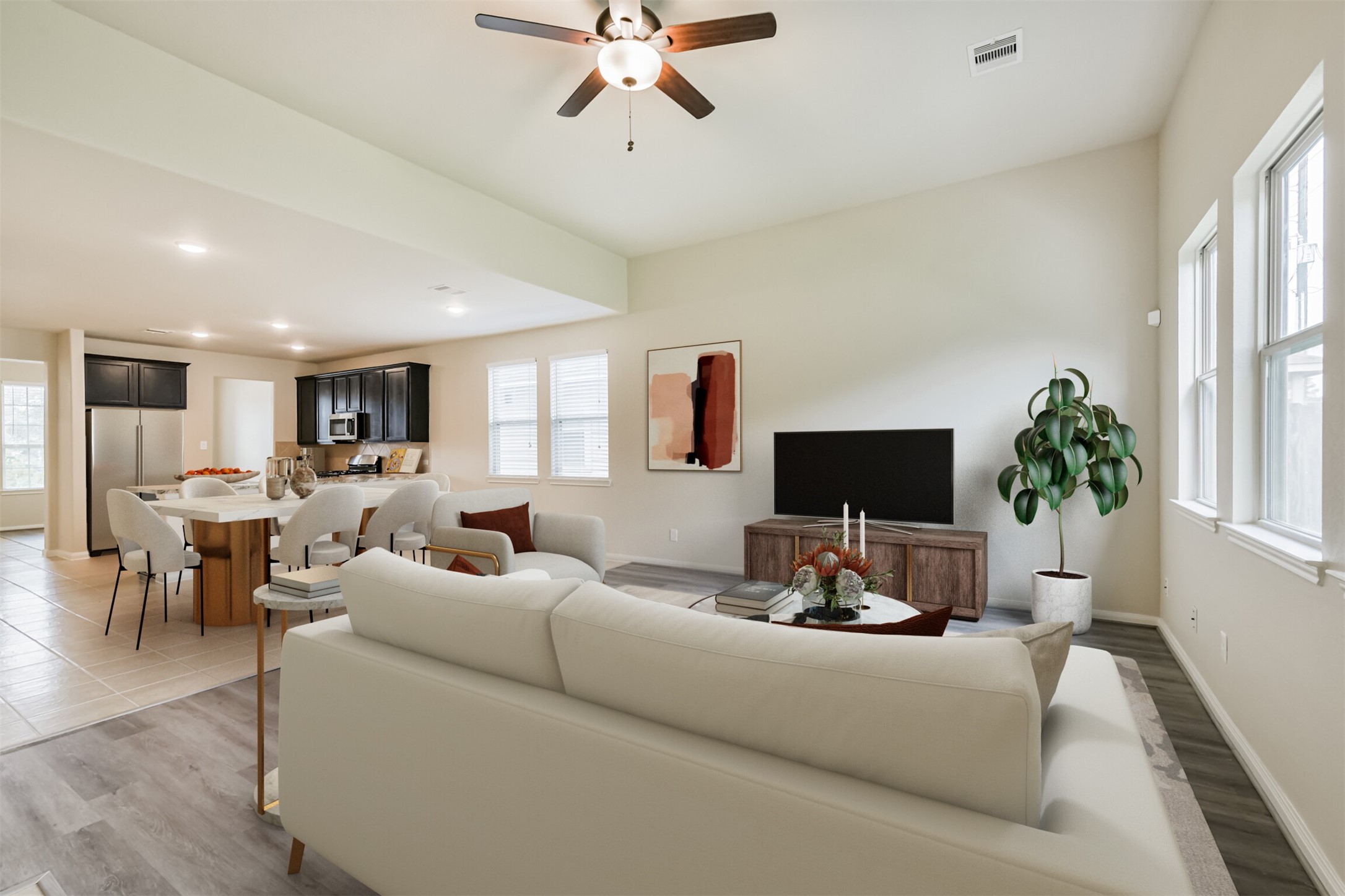12638 Silver Winter Trail Houston, TX 77014 - Photo 4 of 35 Virtual Staging for a Kitchen to Dining to Living Room, Open Concept Perspective! Rounded Corners on the Sheetrock are Expensive Construction Items and Represents a Serious Upgrade. Note the High Ceiling and Lots of Light!