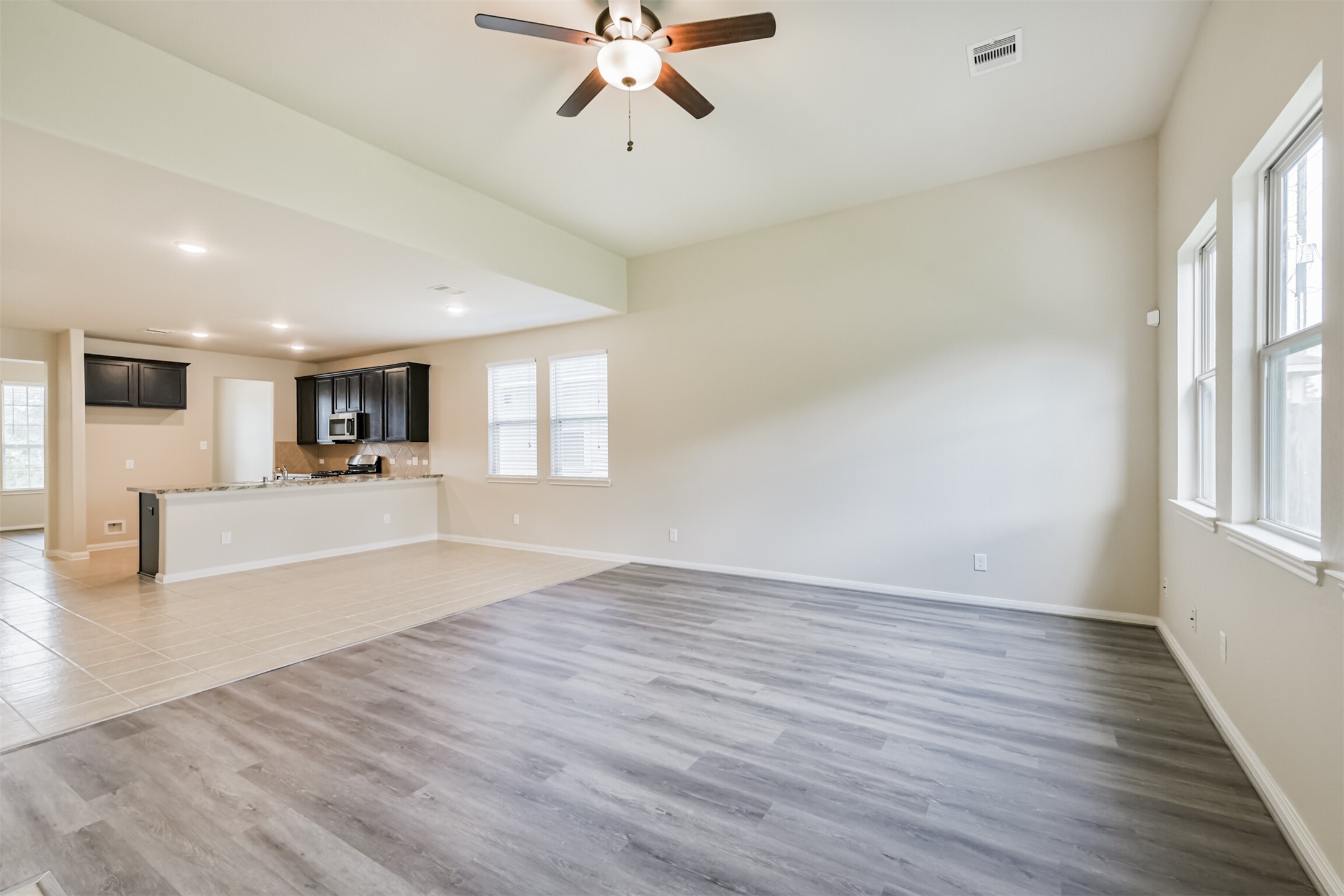 12638 Silver Winter Trail Houston, TX 77014 - Photo 5 of 35 A Good Photo Perspective Showing the Overall Room Layout and Kitchen Location without Staging Feature!