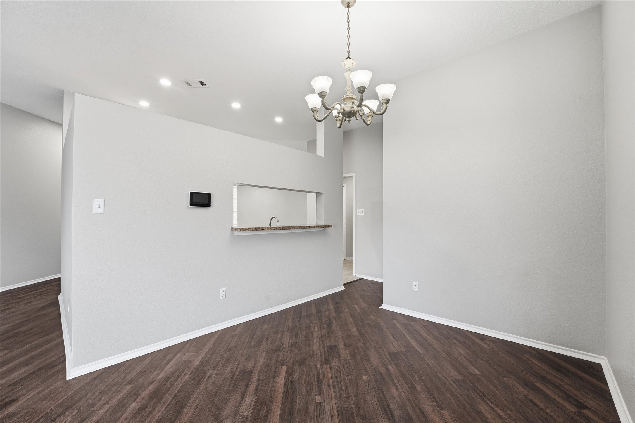 2618 Heather Knoll Drive Spring, TX 77373 - Photo 12 of 32 a view of a room with wooden floor and ceiling fan