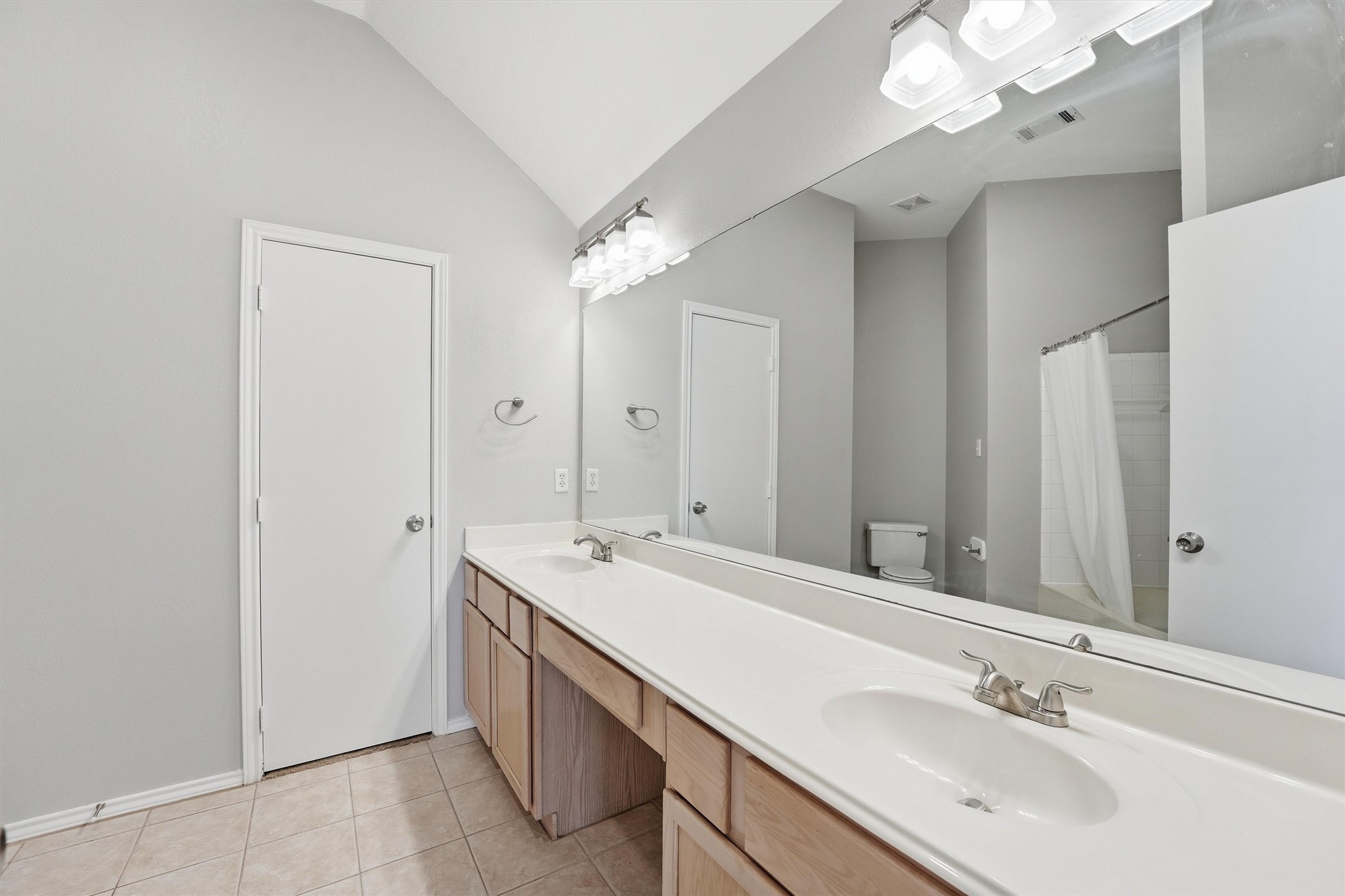 2618 Heather Knoll Drive Spring, TX 77373 - Photo 21 of 32 a spacious bathroom with a double vanity sink mirror and