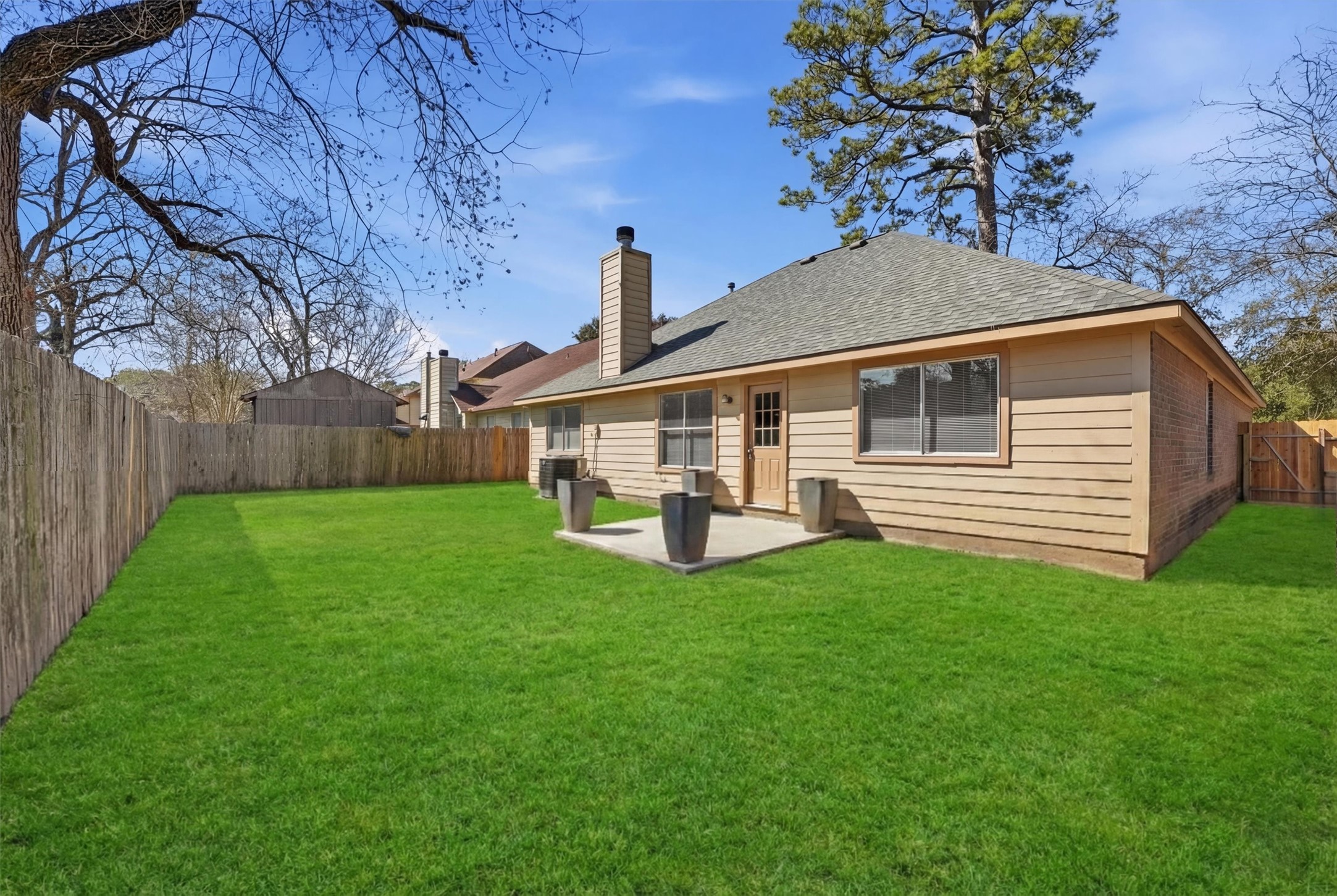 2618 Heather Knoll Drive Spring, TX 77373 - Photo 29 of 32 a front view of a house with yard and tree