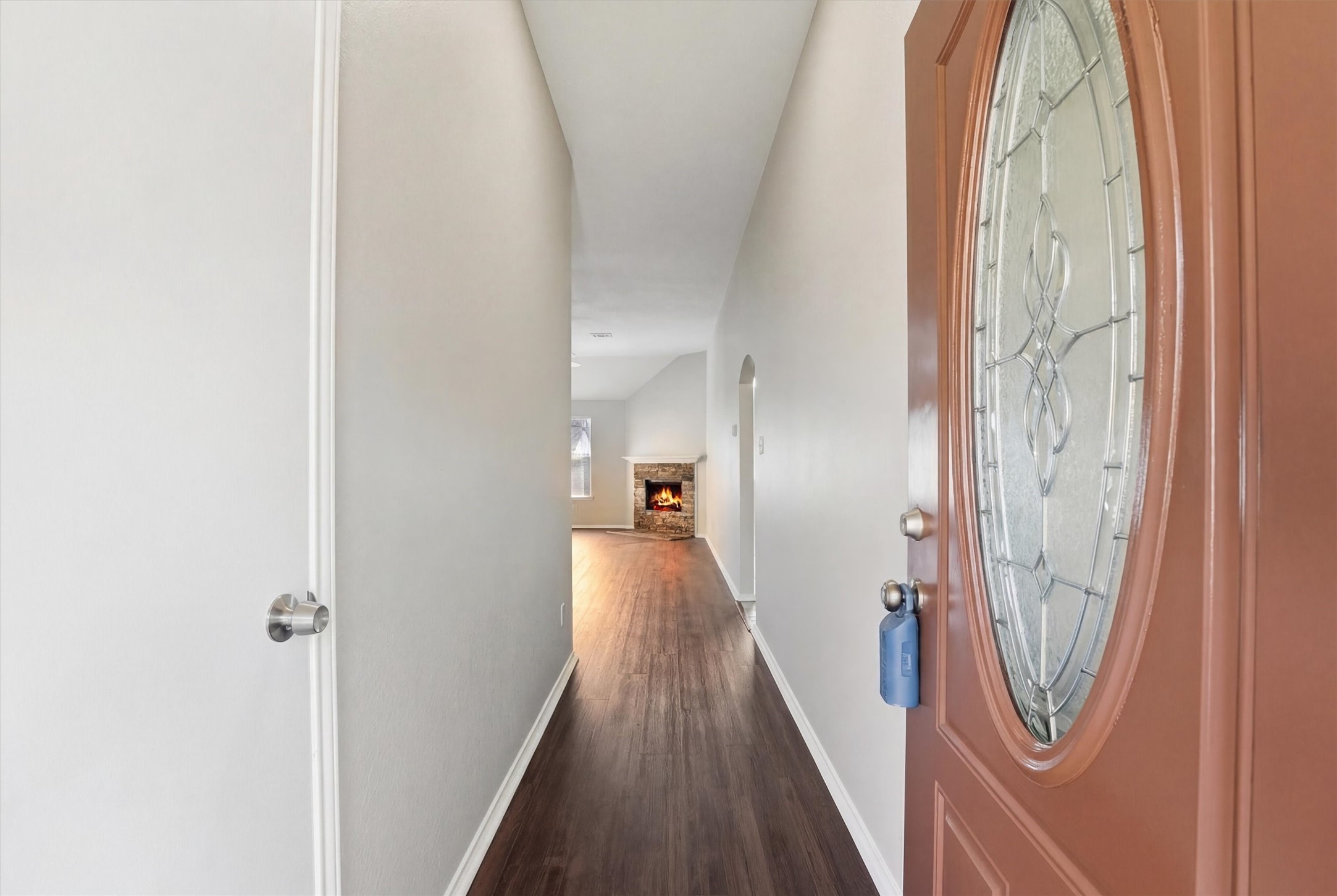 2618 Heather Knoll Drive Spring, TX 77373 - Photo 6 of 32 a view of a hallway with wooden floor and staircase