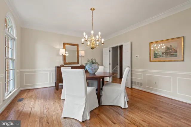 a bathroom with a sink toilet and mirror
