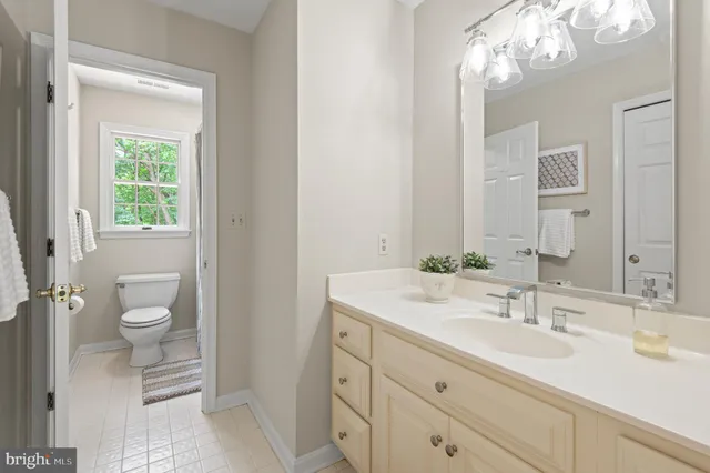 a view of a hallway with staircase