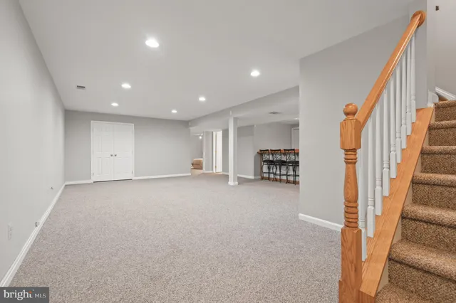 a view of a livingroom with a staircase