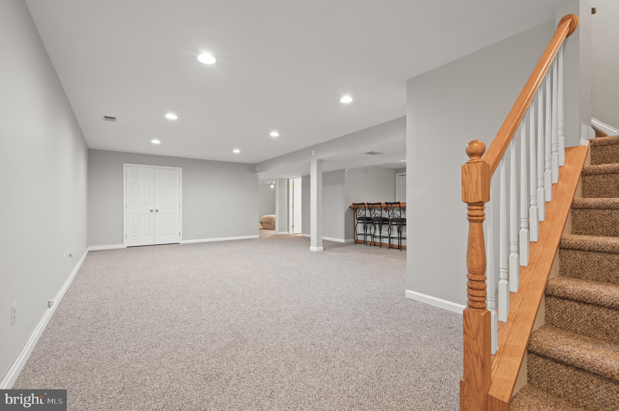 8 Henderson Hill Court Monkton, MD 21111 - Photo 34 of 55 a view of a livingroom with a staircase