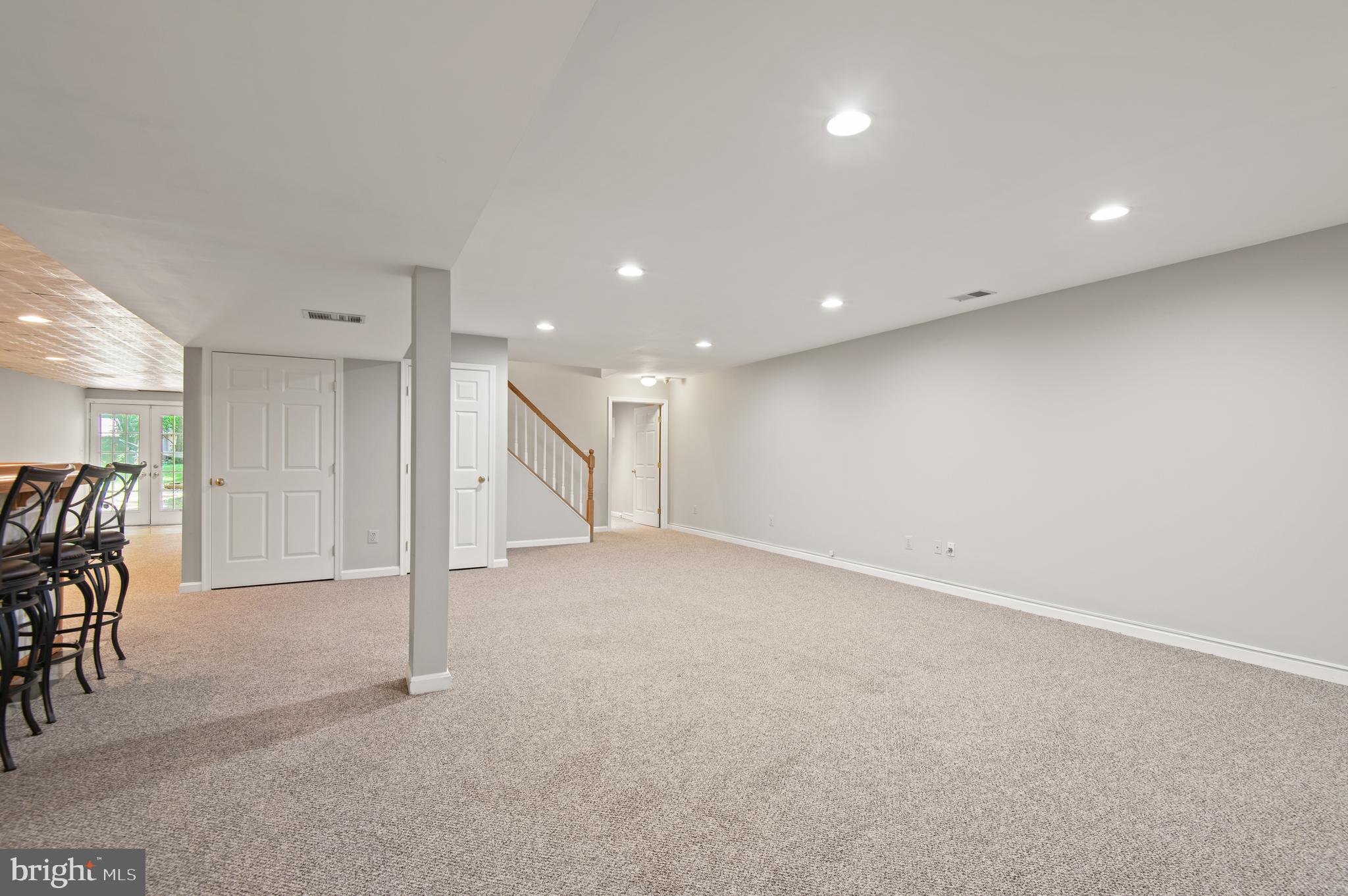 8 Henderson Hill Court Monkton, MD 21111 - Photo 35 of 55 an empty room with furniture and a table