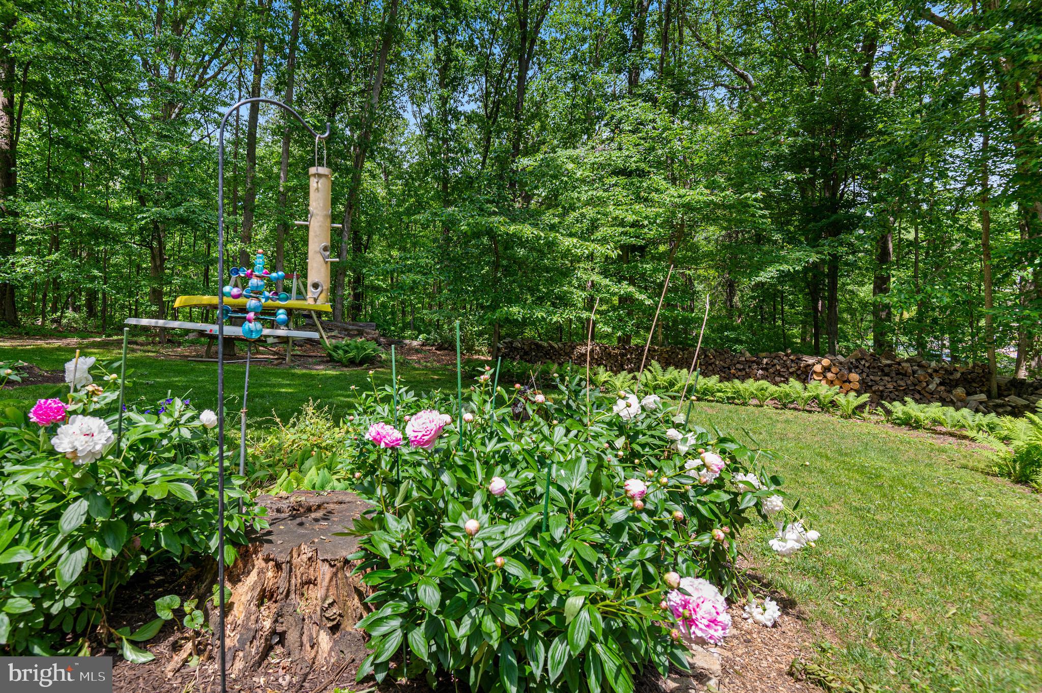 8 Henderson Hill Court Monkton, MD 21111 - Photo 43 of 55 a view of a garden with flowers and trees